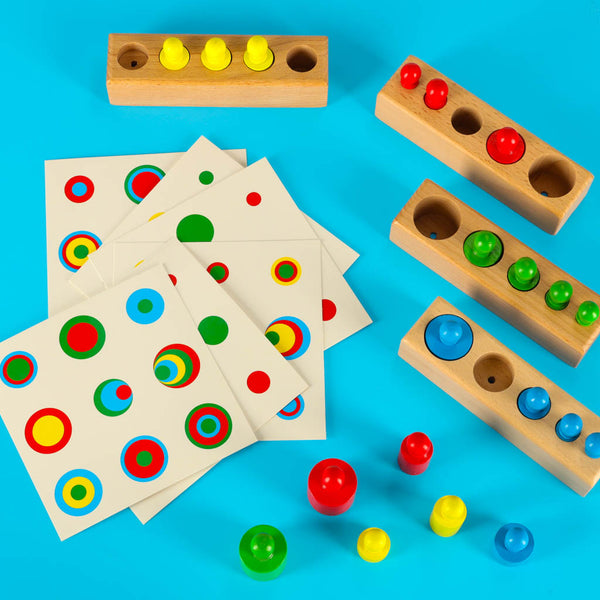 Montessori koka cilindru atsvari krāsaini